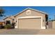 Close up of the home's garage showcasing its clean and neutral design at 6129 S White Pl, Chandler, AZ 85249