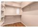 Empty walk-in closet with shelving at 6129 S White Pl, Chandler, AZ 85249