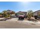 Single-story home with a two-car garage, low maintenance yard, and desert landscaping at 6313 W Pioneer St, Phoenix, AZ 85043