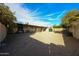 Wide-angle view of the backyard, featuring low maintenance landscaping and a spacious layout at 6331 W Eva St, Glendale, AZ 85302