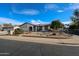 Lovely single-Gathering home with attractive desert landscaping and mature citrus tree at 6331 W Eva St, Glendale, AZ 85302