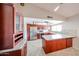 Modern kitchen with a breakfast bar and stainless steel appliances, and lots of cabinet space at 6331 W Eva St, Glendale, AZ 85302