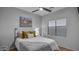 Cozy bedroom with a comfortable bed, soft pillows, and a serene wall art piece at 6993 S Ruby Dr, Chandler, AZ 85249