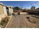 Spacious backyard with gravel and outdoor string lights at 8863 W Greer Ave, Peoria, AZ 85345