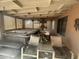 Relaxing enclosed patio featuring a hot tub and comfortable seating area at 8863 W Greer Ave, Peoria, AZ 85345