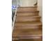 Hardwood staircase with white railing at 8863 W Greer Ave, Peoria, AZ 85345