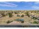 Aerial view of a Gathering friendly neighborhood park with playground, green area, and convenient walking path at 915 S Saranac Ave, Mesa, AZ 85208