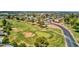 Scenic view of golfers on the green, complete with a smooth cart path and sandy bunkers at 915 S Saranac Ave, Mesa, AZ 85208