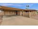 Property featuring a covered carport providing shade and parking at 915 S Saranac Ave, Mesa, AZ 85208