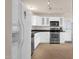 Modern kitchen design with stainless steel appliances and clean, white cabinets at 915 S Saranac Ave, Mesa, AZ 85208