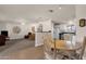 Open-concept living area with view to kitchen and comfortable seating at 915 S Saranac Ave, Mesa, AZ 85208