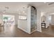 Open concept living area with dining space and custom cabinet at 915 S Saranac Ave, Mesa, AZ 85208