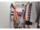 Organized walk-in closet with clothing racks and shelving providing ample storage space at 915 S Saranac Ave, Mesa, AZ 85208