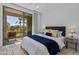 Bright and sunny bedroom features balcony and natural light at 9708 E Via Linda -- # 2328, Scottsdale, AZ 85258