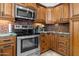 Updated kitchen featuring stainless steel appliances, modern cabinetry, and stylish backsplash at 9708 E Via Linda -- # 2328, Scottsdale, AZ 85258