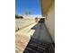 View of a concrete side yard with brick trim at 9929 W Burns Dr, Sun City, AZ 85351