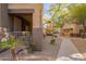 Exterior view of condo building with courtyard, walkway, and desert landscaping at 10136 E Southern Ave # 1082, Mesa, AZ 85209