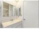 A bathroom featuring a vanity and a mirror with a medicine cabinet at 10319 W Twin Oaks Dr, Sun City, AZ 85351