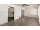 Living room features tiled floors with entryway into kitchen at 10319 W Twin Oaks Dr, Sun City, AZ 85351