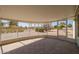 Enclosed patio with tile flooring provides an enjoyable place to relax outdoors year-round at 10319 W Twin Oaks Dr, Sun City, AZ 85351