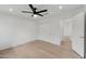 Bedroom featuring light hardwood floors, recessed lighting, a ceiling fan, and closet at 10360 N 98Th St, Scottsdale, AZ 85258