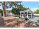 Outdoor grill and pergola sitting by green lawn at 10360 N 98Th St, Scottsdale, AZ 85258