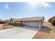 Beautiful single-story home with an attached garage and xeriscaped yard at 10809 W El Dorado Dr, Sun City, AZ 85351