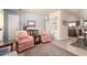 Bright living room with classic furnishings and neutral tile flooring at 10809 W El Dorado Dr, Sun City, AZ 85351