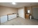 Practical laundry area with storage, sink, and appliances at 10822 W Mimosa Dr, Sun City, AZ 85373