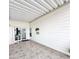 Spacious covered porch with tiled flooring and white exterior at 111 S Greenfield Rd -- # 462, Mesa, AZ 85206