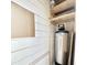 Close up of the utility closet featuring a water tank at 111 S Greenfield Rd -- # 462, Mesa, AZ 85206