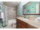 Bathroom featuring tub and shower, granite countertops, and modern fixtures at 11445 S 44Th St, Phoenix, AZ 85044