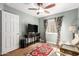 Inviting sitting room featuring hardwood floors, area rug, and lots of natural light at 11445 S 44Th St, Phoenix, AZ 85044