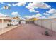 Backyard featuring a white storage shed and desert landscaping at 12220 N Escobar Way, Phoenix, AZ 85022