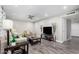 Cozy living room with wood floors, recessed lighting, and neutral tones at 12220 N Escobar Way, Phoenix, AZ 85022