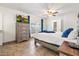 Bedroom featuring a dresser with a TV, a sliding glass door to the patio, and tile floors at 1309 E Echo Ln, Phoenix, AZ 85020