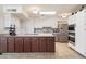 Spacious kitchen featuring ample cabinet space and stainless steel appliances at 1309 E Echo Ln, Phoenix, AZ 85020