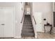 A carpeted staircase leads to the upper level at 13232 W Ironwood St, Surprise, AZ 85374