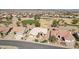 Overhead shot showcasing a lovely single-Gathering home near the golf course with mature desert landscaping at 14110 W Robertson Dr, Sun City West, AZ 85375