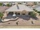 Aerial view of house with a patio, cactus landscaping and large windows at 14110 W Robertson Dr, Sun City West, AZ 85375