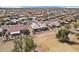 Aerial view of house with a desert landscaped yard and an outdoor patio at 14110 W Robertson Dr, Sun City West, AZ 85375