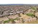 Aerial view of house on a golf course in a desert residential neighborhood at 14110 W Robertson Dr, Sun City West, AZ 85375