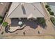 Aerial view of backyard featuring a patio with table and cactus landscaping at 14110 W Robertson Dr, Sun City West, AZ 85375