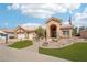 Inviting single-story home featuring a manicured desert landscape, paver walkway, and a classic tiled roof at 14110 W Robertson Dr, Sun City West, AZ 85375