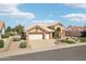 Well-maintained single-story home featuring a tile roof, a two-car garage, and drought tolerant landscaping at 14110 W Robertson Dr, Sun City West, AZ 85375