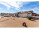 Inviting single-Gathering house featuring desert landscaping, and a two car garage at 14957 W Bottle Tree Ave, Surprise, AZ 85374