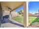 Covered patio overlooking a spacious backyard, perfect for outdoor entertaining at 15137 W Yucatan Dr, Surprise, AZ 85379