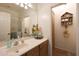 Clean, well-maintained bathroom featuring a vanity with a sink and an enclosed shower at 16546 E Ashbrook Dr # A, Fountain Hills, AZ 85268