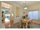 Inviting dining area with a view to the backyard and an open concept design at 16546 E Ashbrook Dr # A, Fountain Hills, AZ 85268