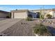 Charming single-story home featuring a two-car garage and desert landscaping at 16546 E Ashbrook Dr # A, Fountain Hills, AZ 85268